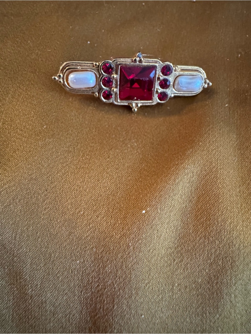 Gold-Tone Bar Brooch with Red and Opalescent Stones